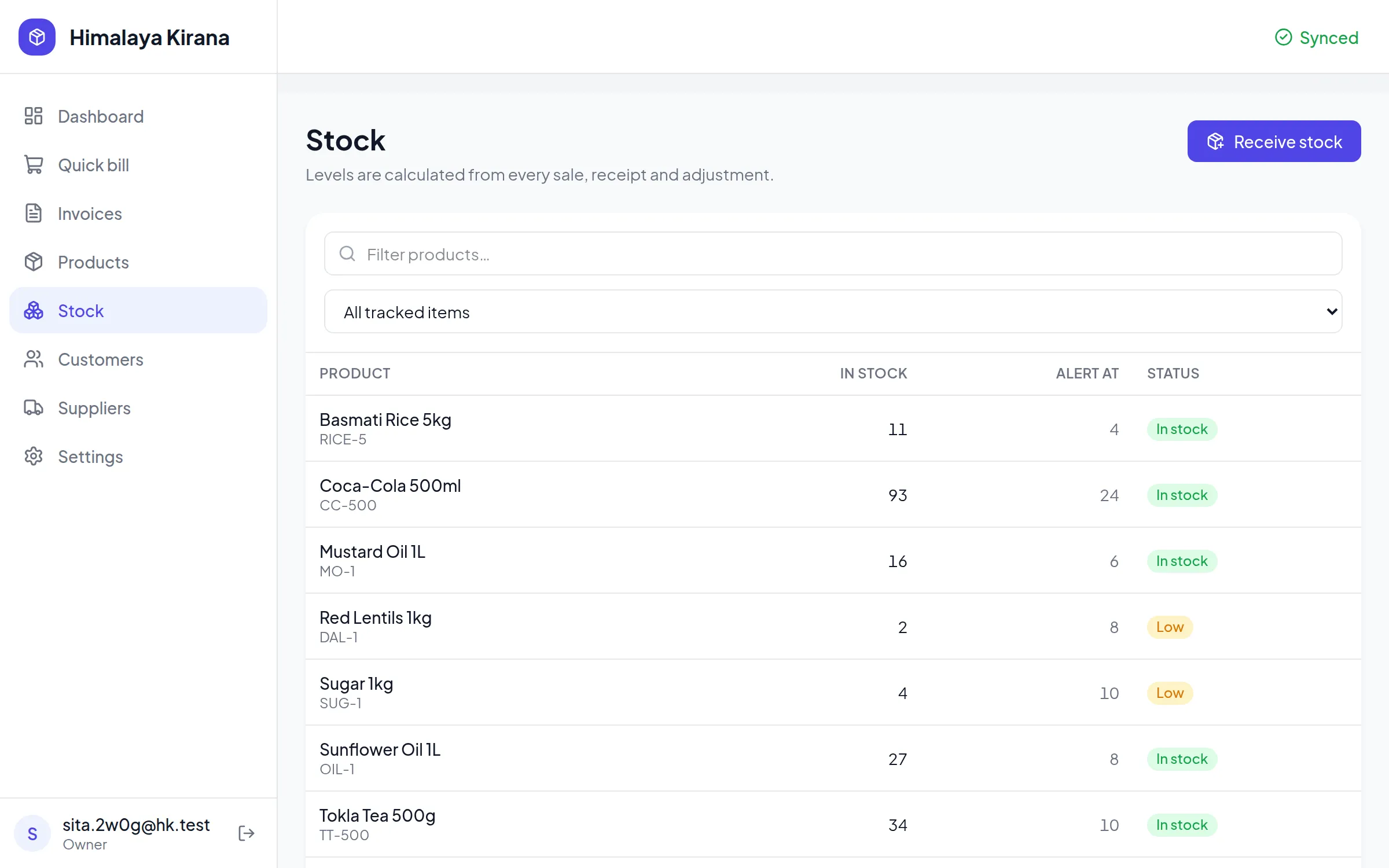 Stock screen listing products, quantities, alert levels and Low badges
